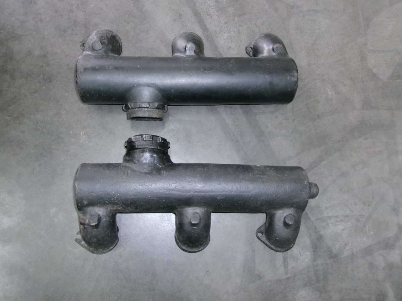 Used exhaust manifolds for a Silver Ghost from around 1923