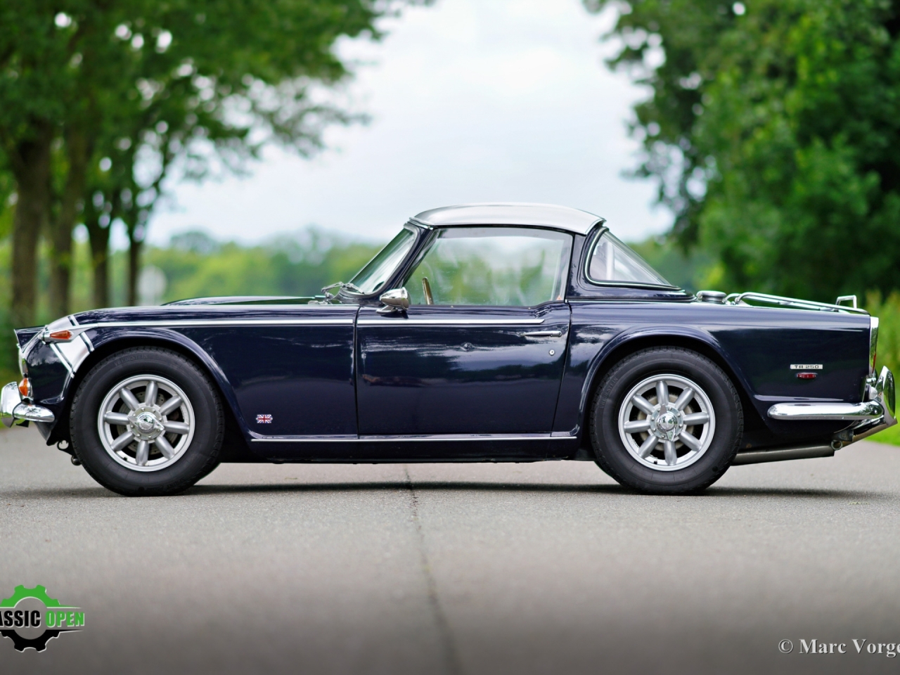 Triumph TR250 with Surrey Top