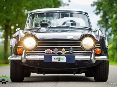 Triumph TR250 with Surrey Top